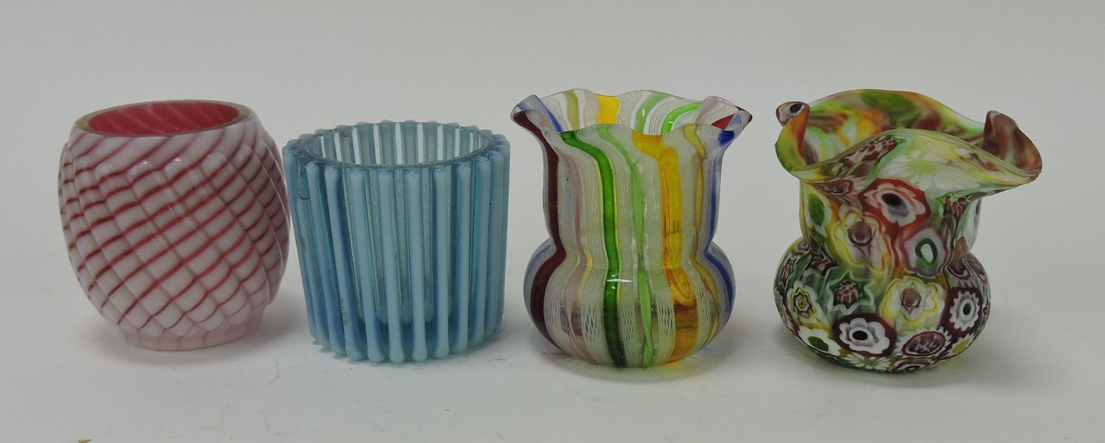 Lot of 4 toothpick holders: .