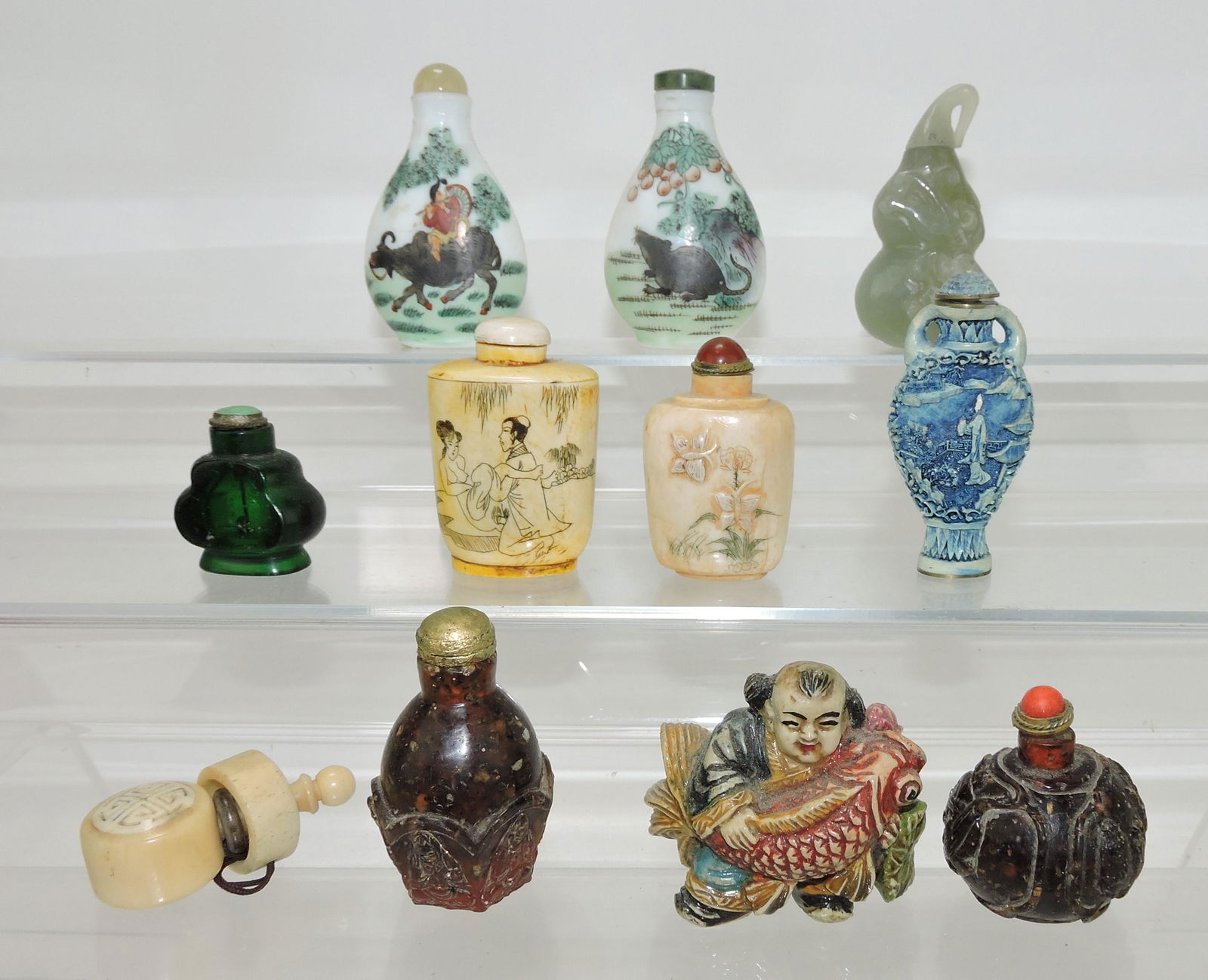 Oriental lot of 11 snuff bottles (1 of 2)