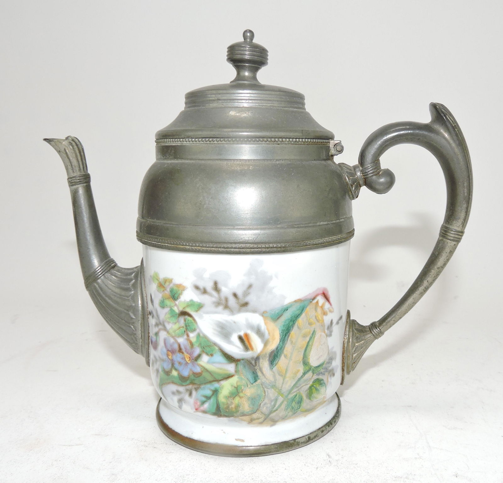 Granite enameled tea pot with: flowers, 5"