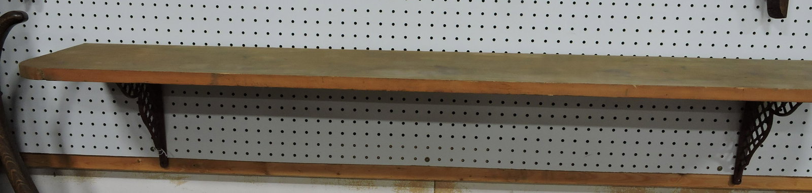 Early wooden shelf with cast iron: brackets, 58"w, 10"d
