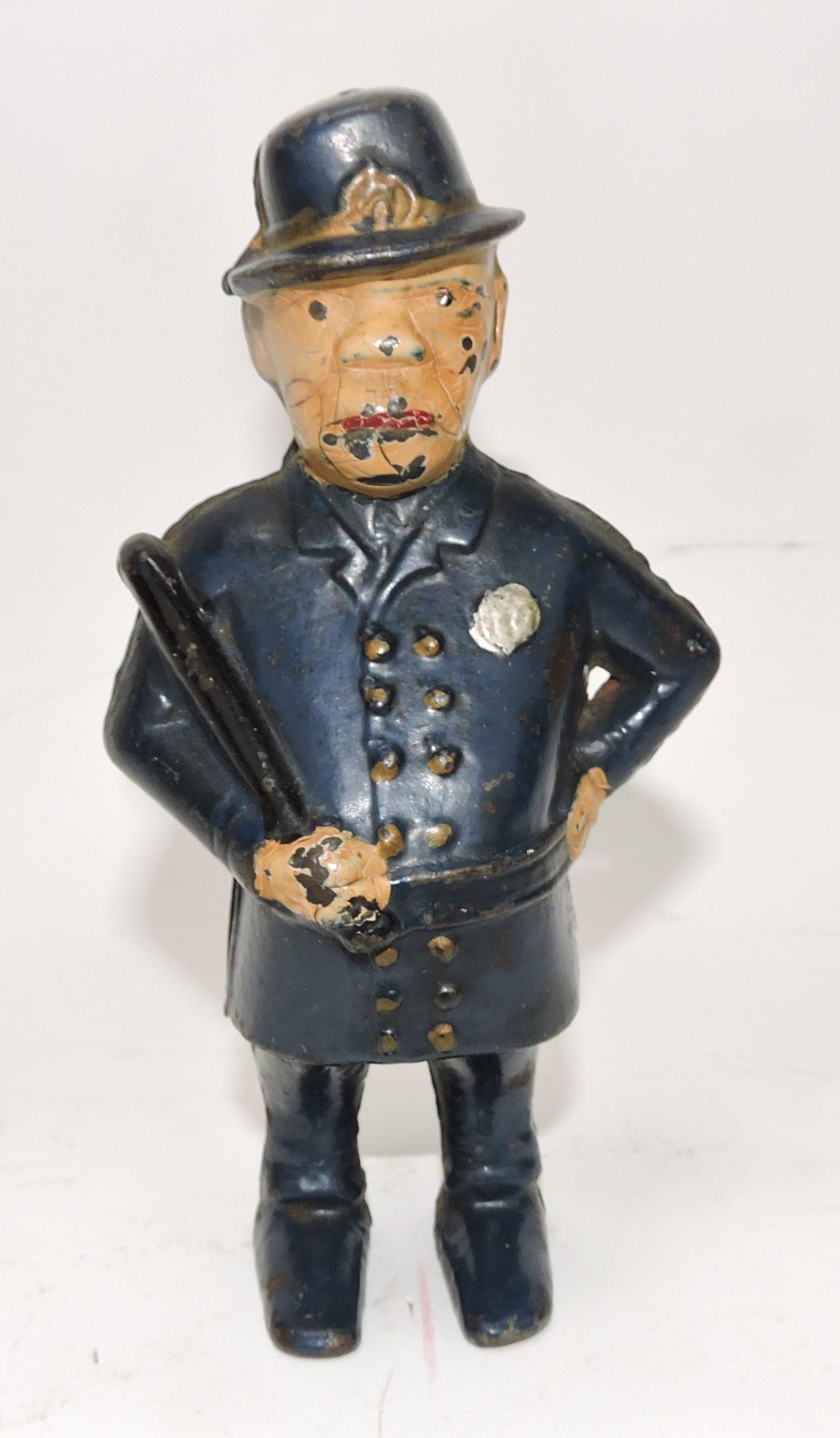 Cast iron policeman still bank, 6", (1 of 1)