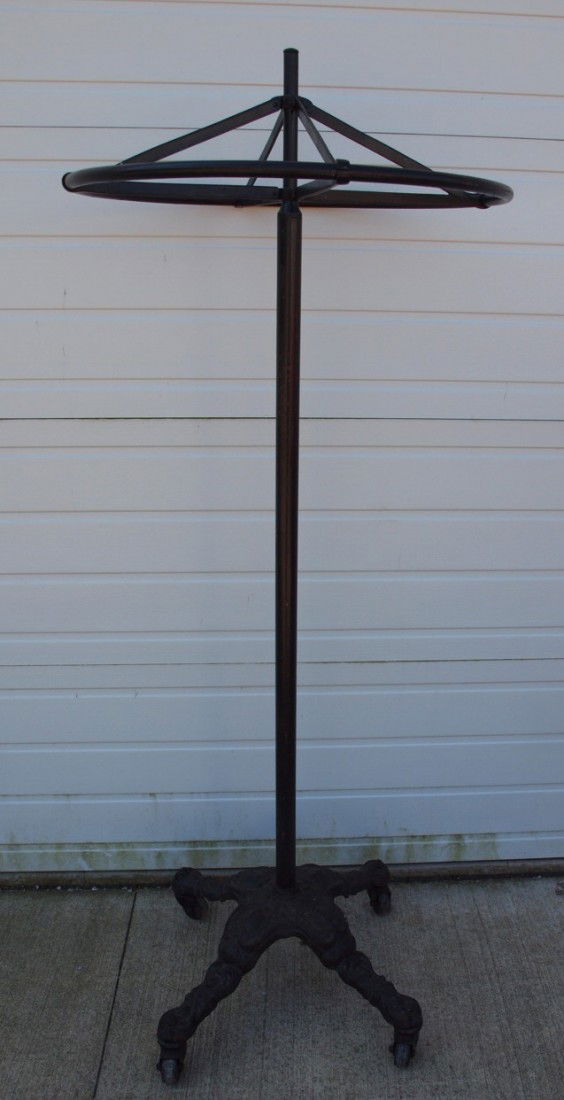 Cast iron base vintage clothing store clothes rack: Cast iron base vintage clothing store clothes rack