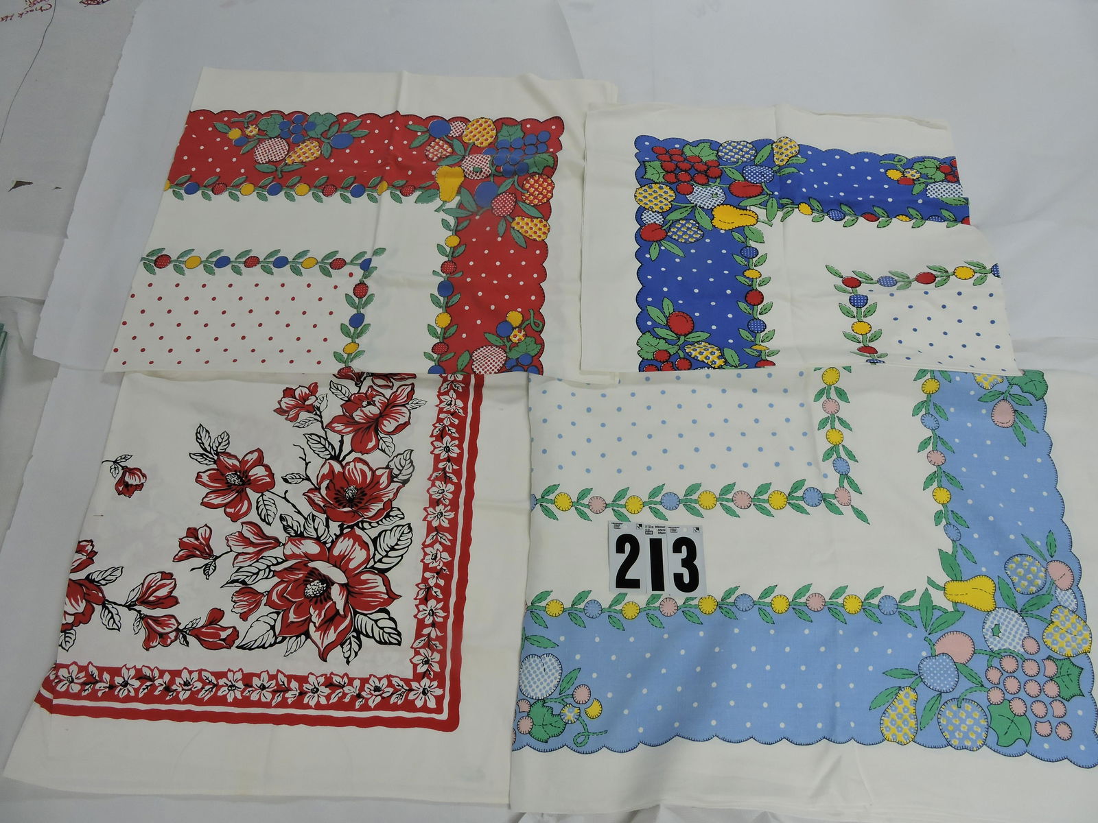 Lot of 4 vintage tablecloths: .