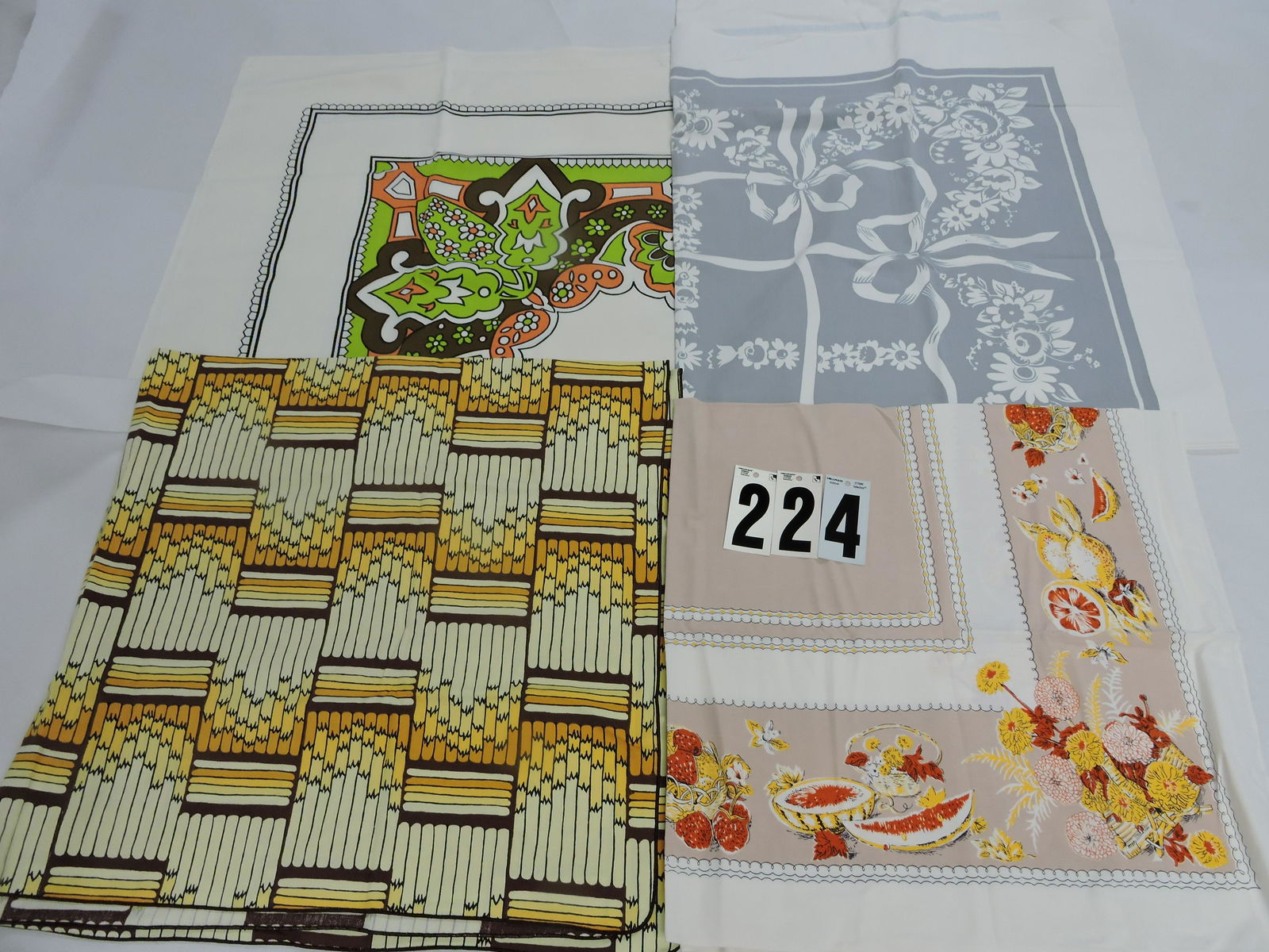 Lot of 4 vintage tablecloths: .