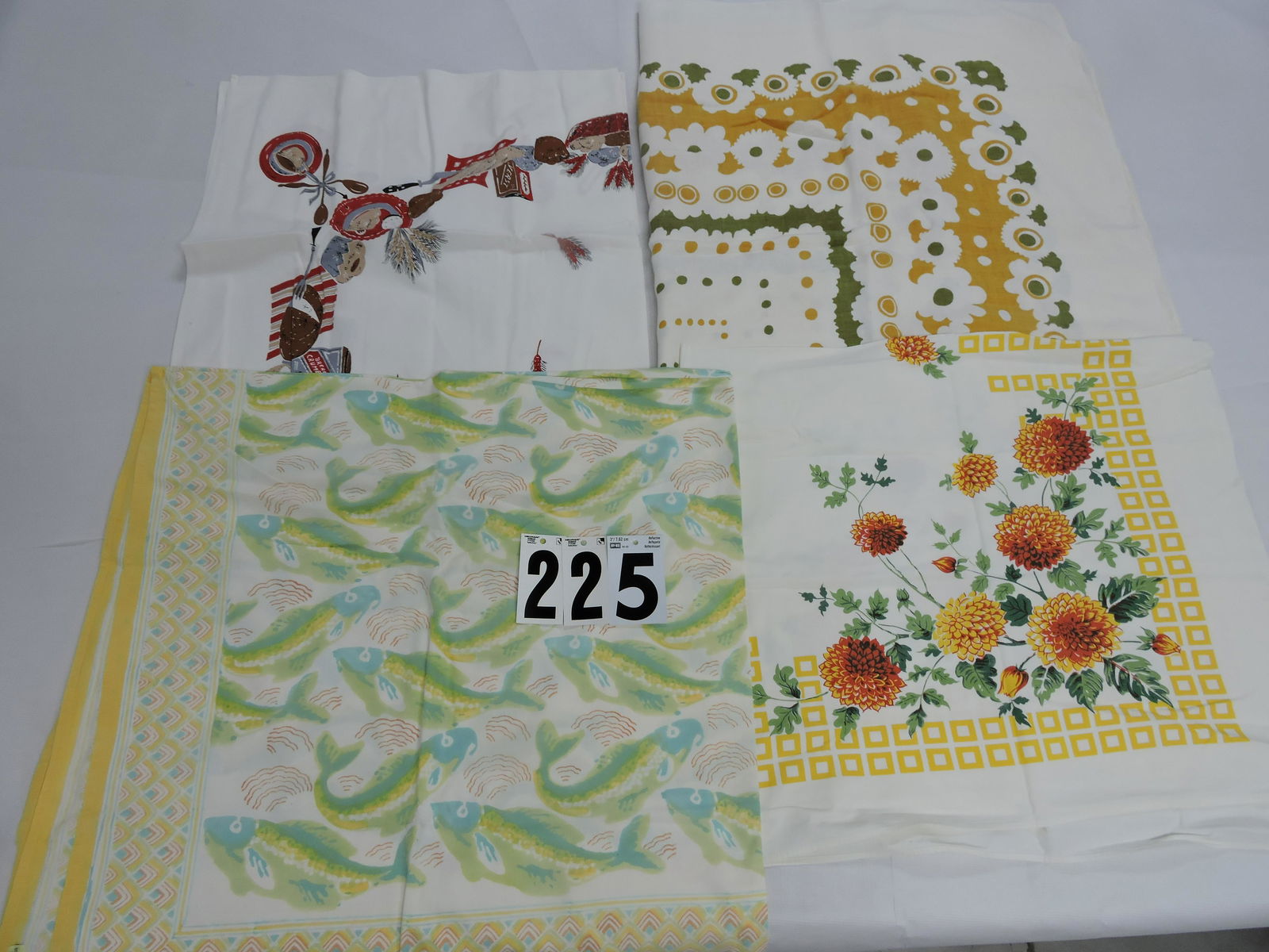 Lot of 4 vintage tablecloths: .