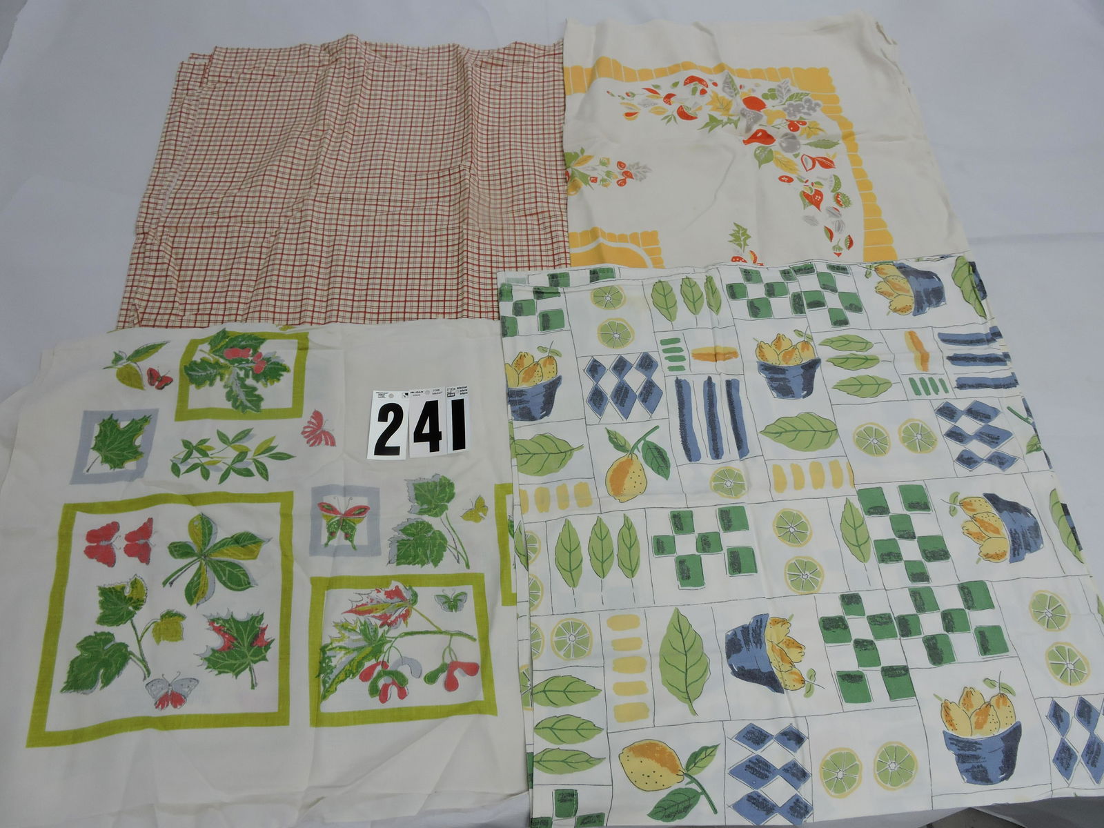 Lot of 4 vintage tablecloths: .