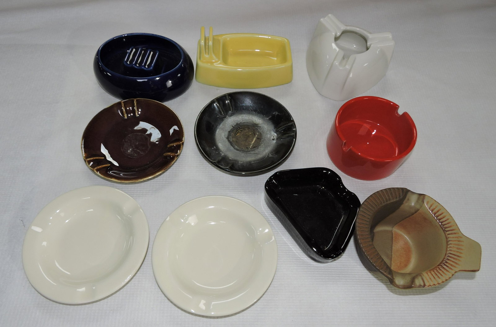 Hall China lot of 10 ashtrays, some: samples