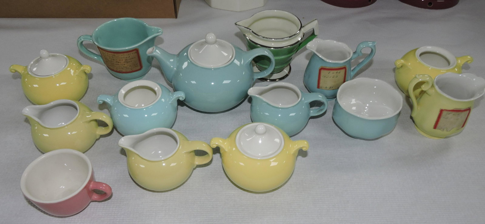 Hall China lot of creamers, sugars, and: teapot, many samples