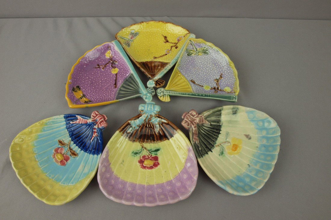 Majolica lot of 3 floral fan sauce dishes and 3 dr: Majolica lot of 3 floral fan sauce dishes and 3 dragonfly fan sauce dishes, various condition