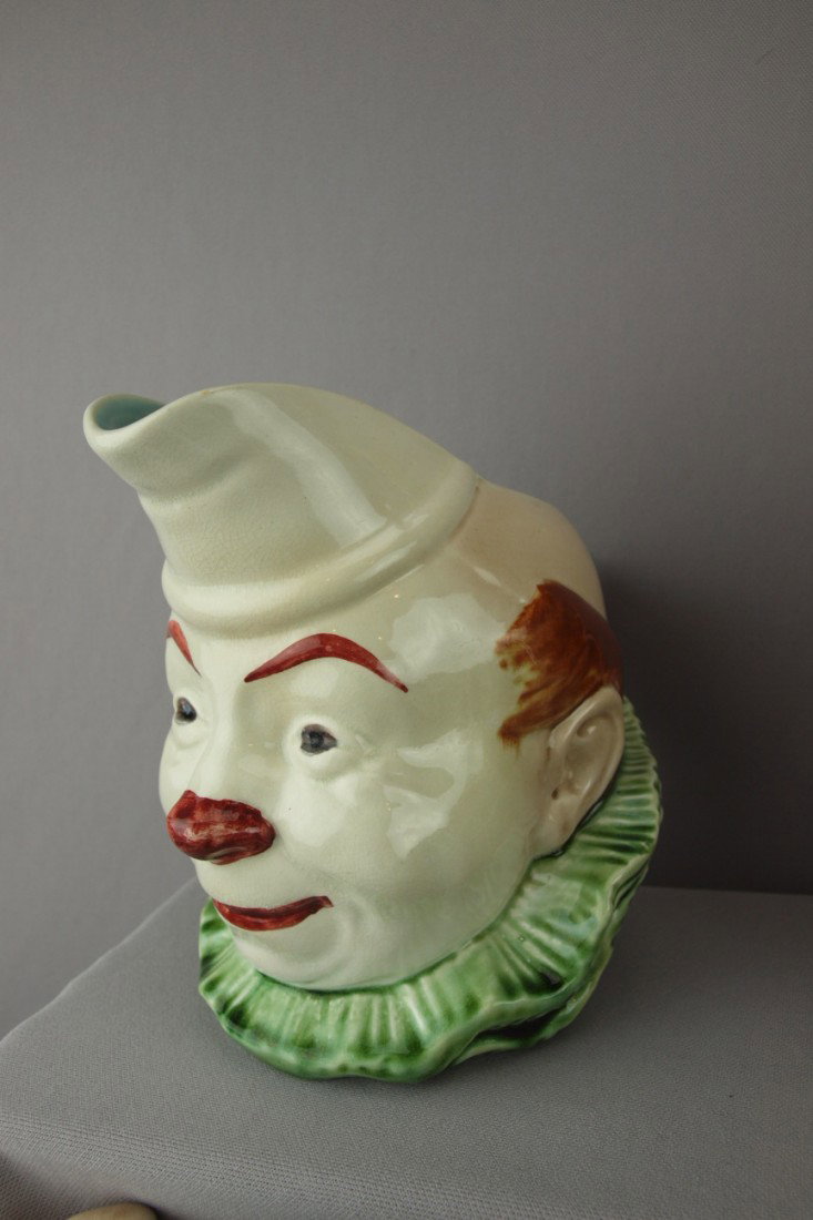 SARREGUEMINES clown figural jug with smiling face: SARREGUEMINES clown figural jug with smiling face, ref: Cunningham p. 65, minor hairline at handle, 6 3/4"