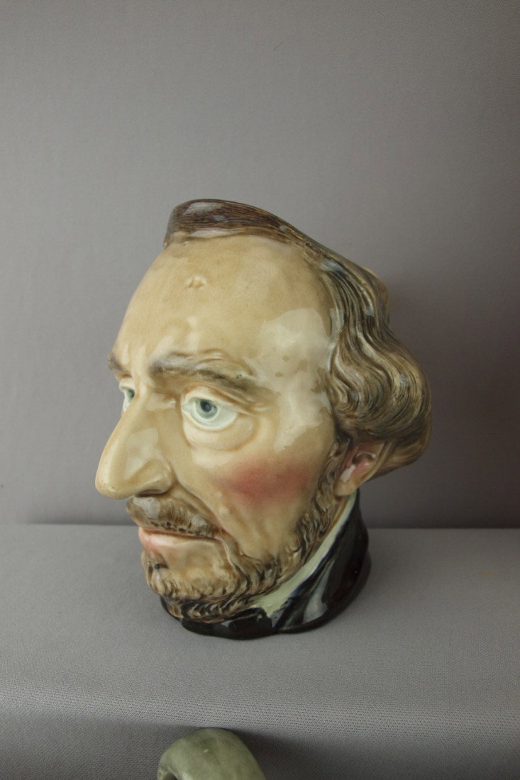 SARREGUEMINES "Bartolome Mitre" figural face jug,: SARREGUEMINES "Bartolome Mitre" figural face jug, no. 3726, spout repair, 7 1/2"