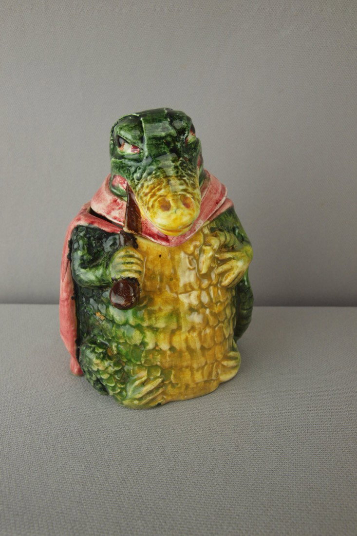 Figural aligator with red cape and pipe humidor, : Figural aligator with red cape and pipe humidor, 5"