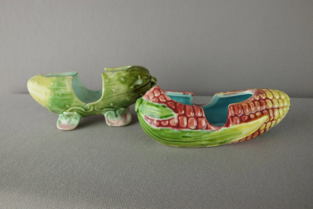 Majolica lot of 2 toothpick holders, one in form : Majolica lot of 2 toothpick holders, one in form of an ear of corn and the other a pickle , rim repair to pickle