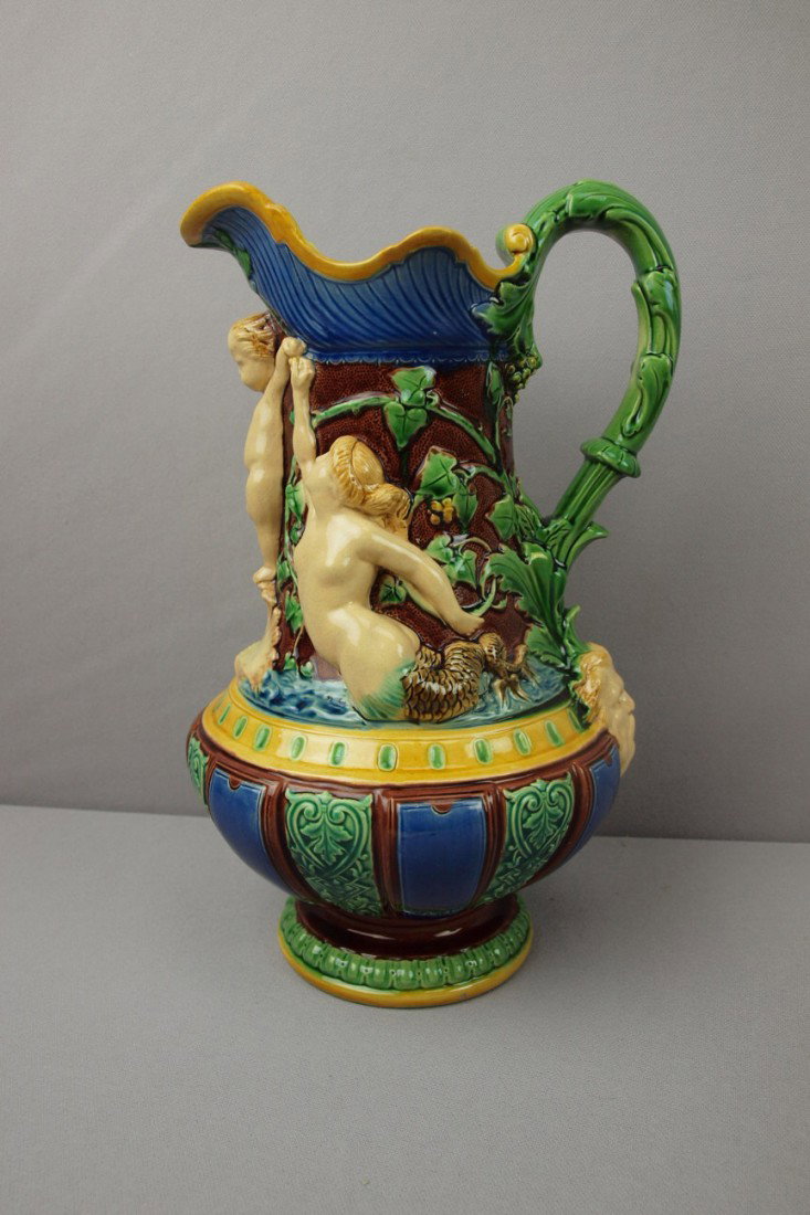 MINTON mermaid wine jug with mermaids in high rel: MINTON mermaid wine jug with mermaids in high relief, 12"h, professional repair to spout