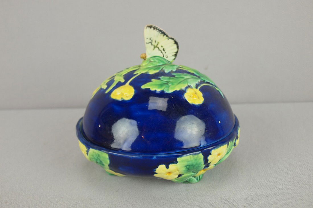 GEORGE JONES cobalt majolica covered primrose but: GEORGE JONES cobalt majolica covered primrose butter dish with butterfly finial handle, minor hairline to base