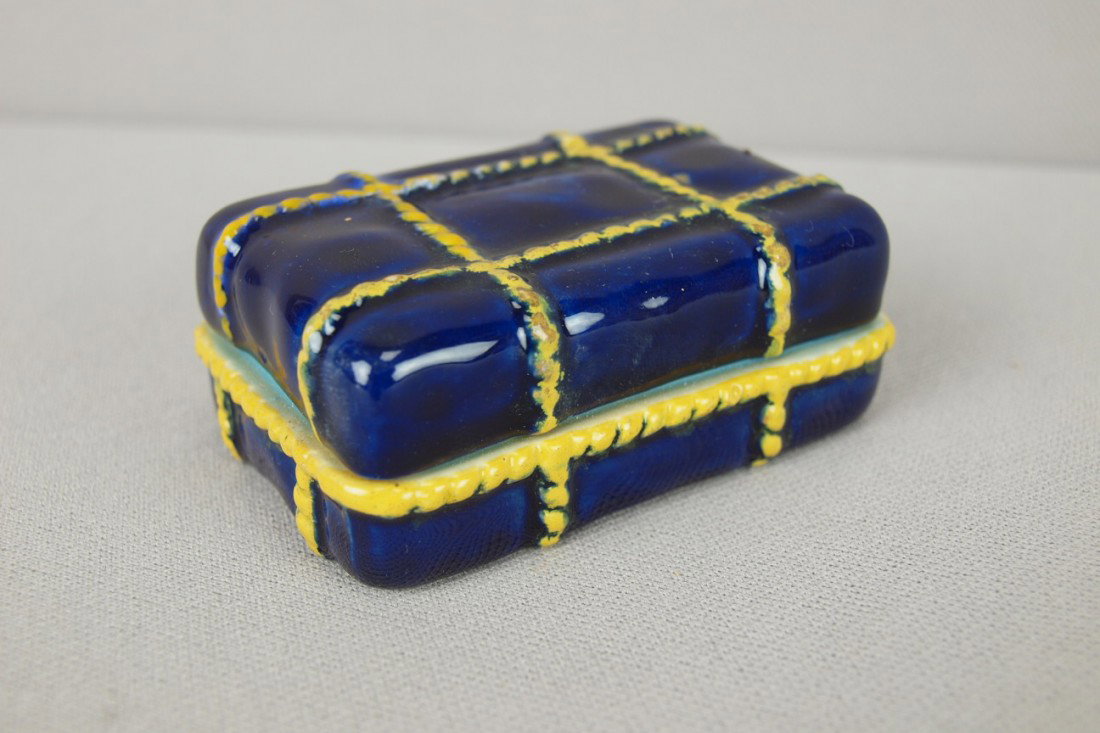GEORGE JONES majolica rare match box in the form : GEORGE JONES majolica rare match box in the form of a cobalt blue package tied with yellow rope, 3"l, very rare