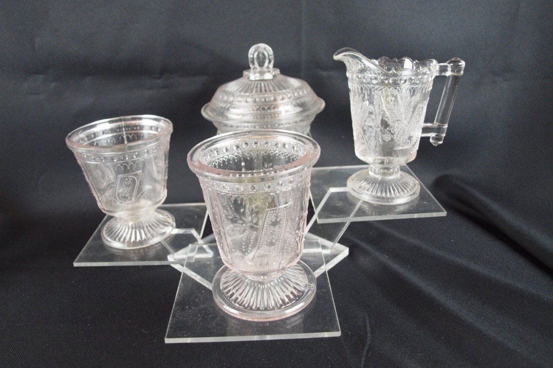 EAPG "Good Luck" 4 piece table set with covered but
