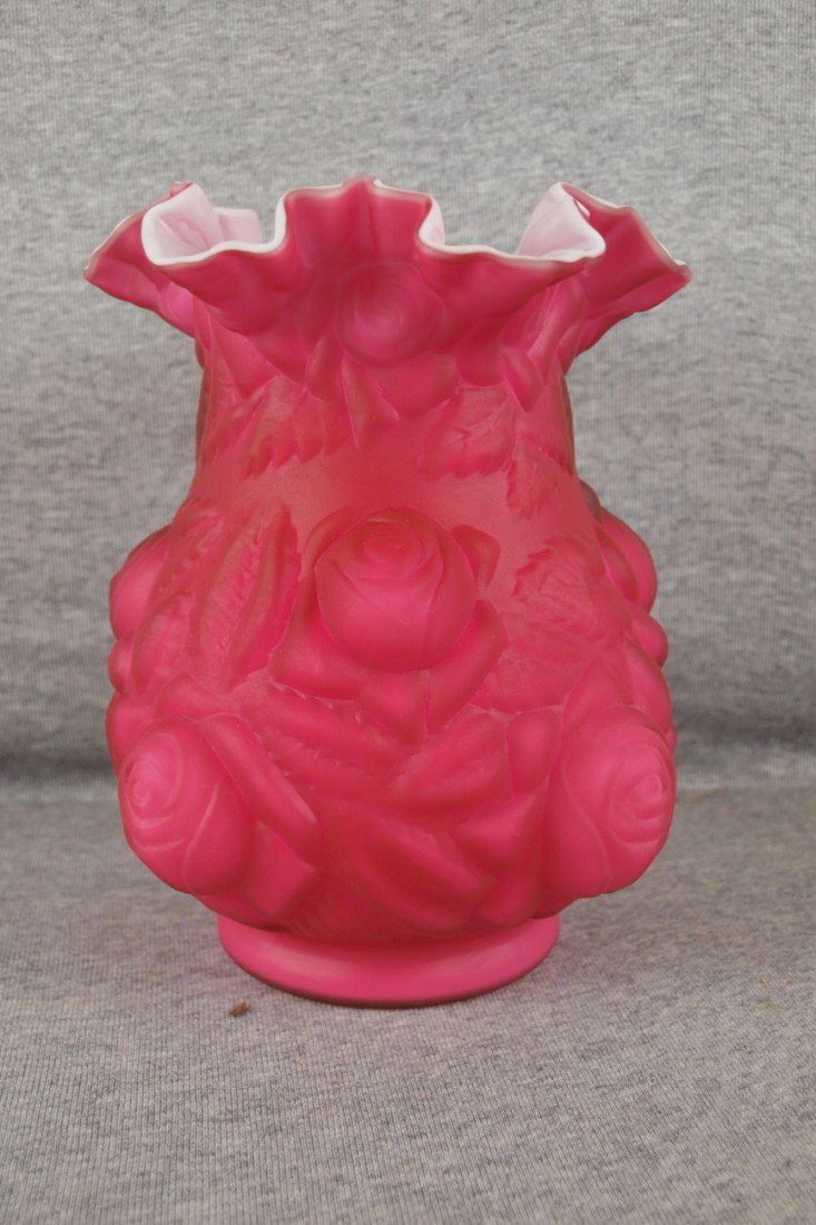 Red satin cased glass vase with rose mold, 8 1/2" 