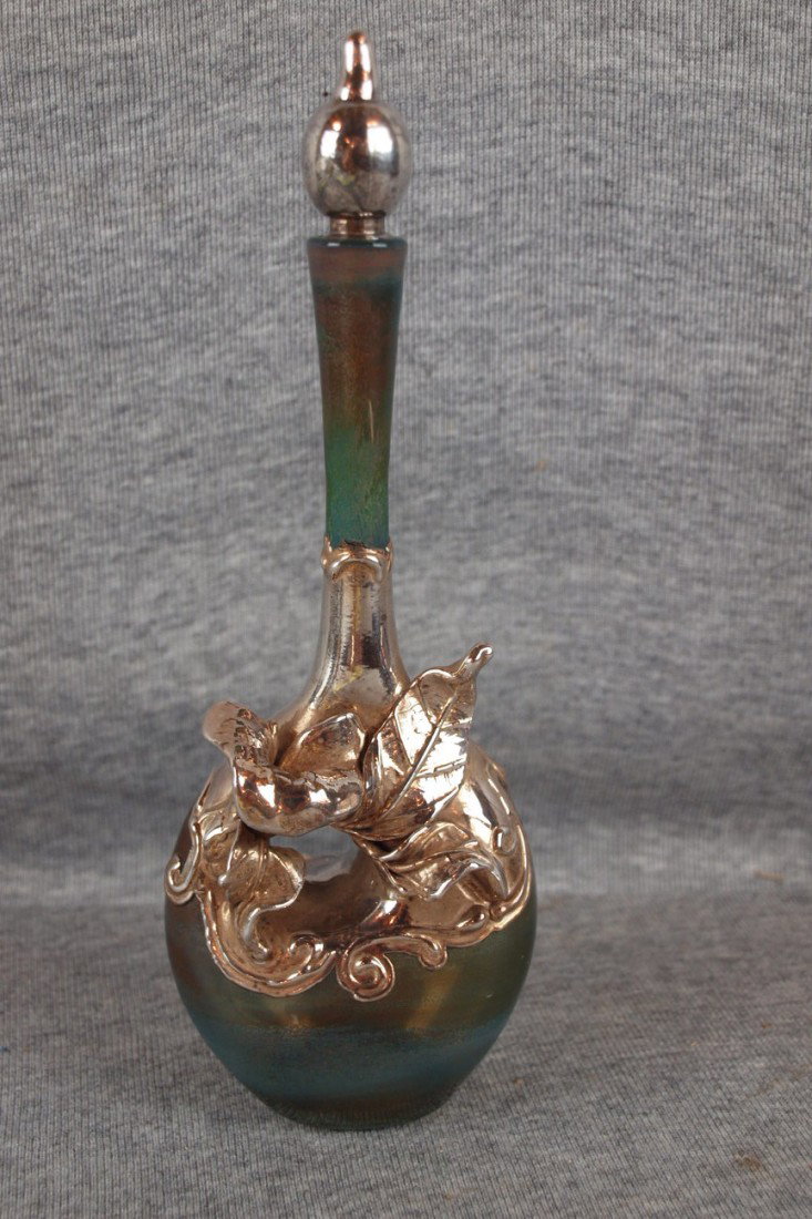 Art glass perfume bottle with silver glass overlay