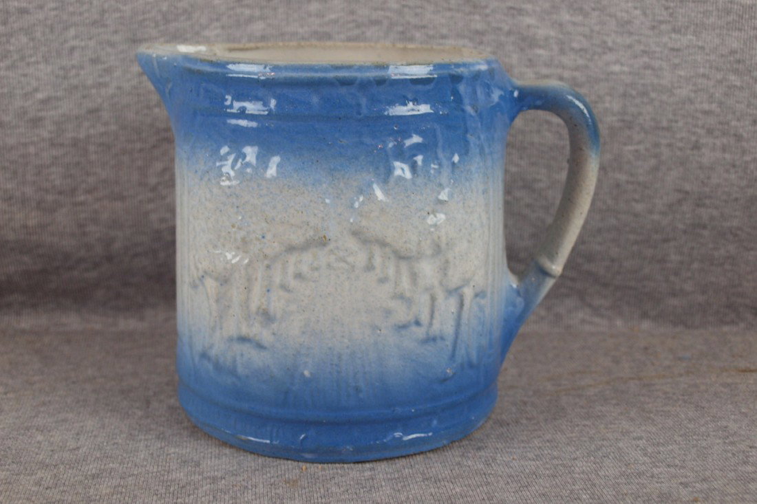 Blue and white stoneware "Avenue of Trees" pitcher