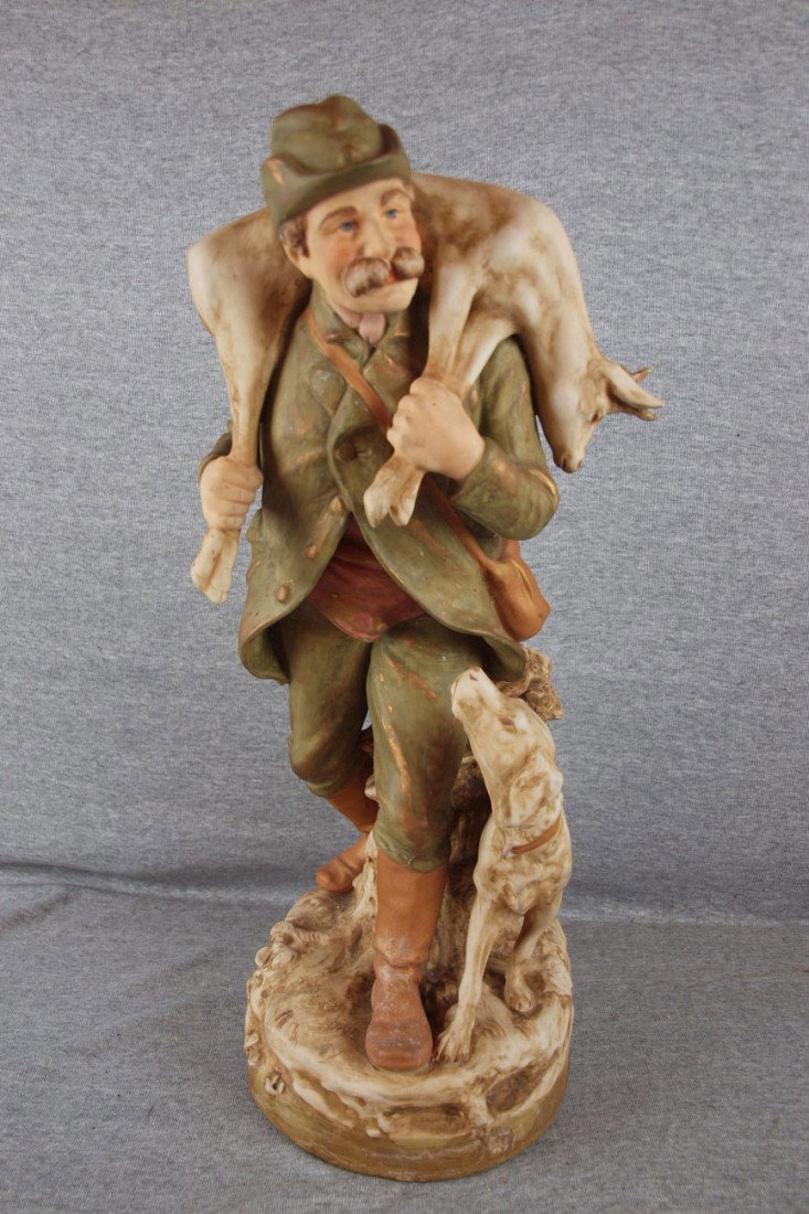 Royal Dux figure of hunter with dog and deer, loss