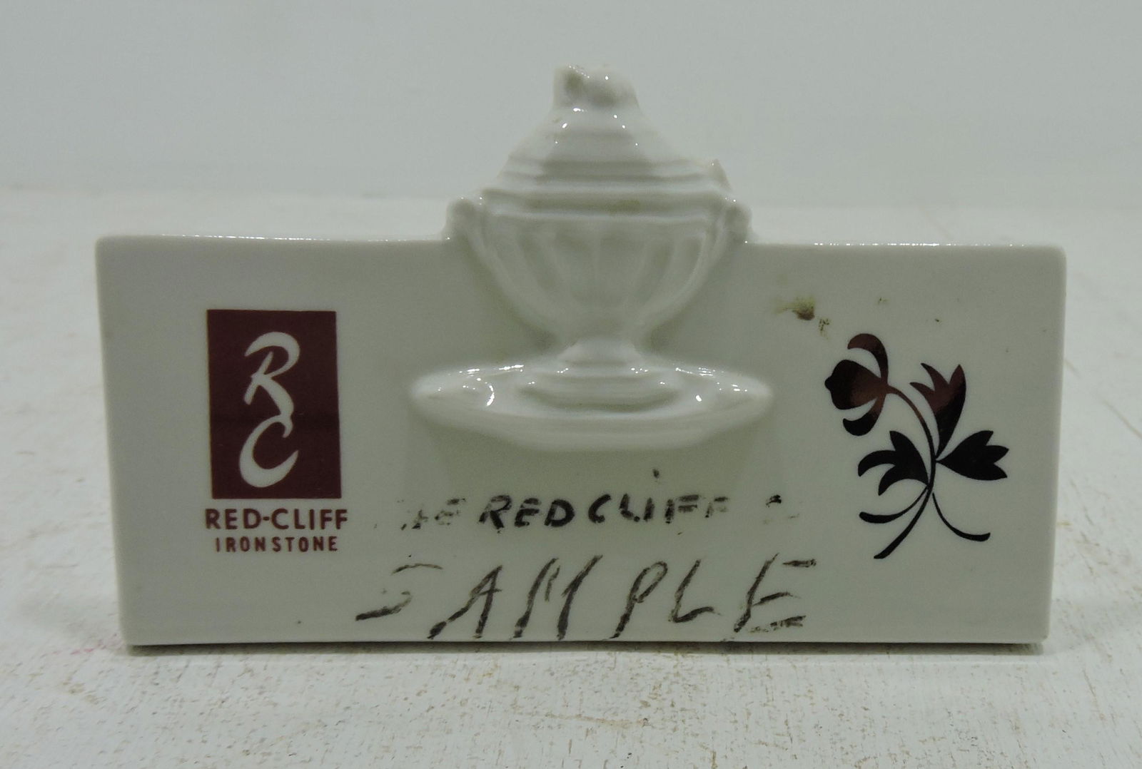 Hall China Red Cliff Ironstone shelf sign (1 of 1)