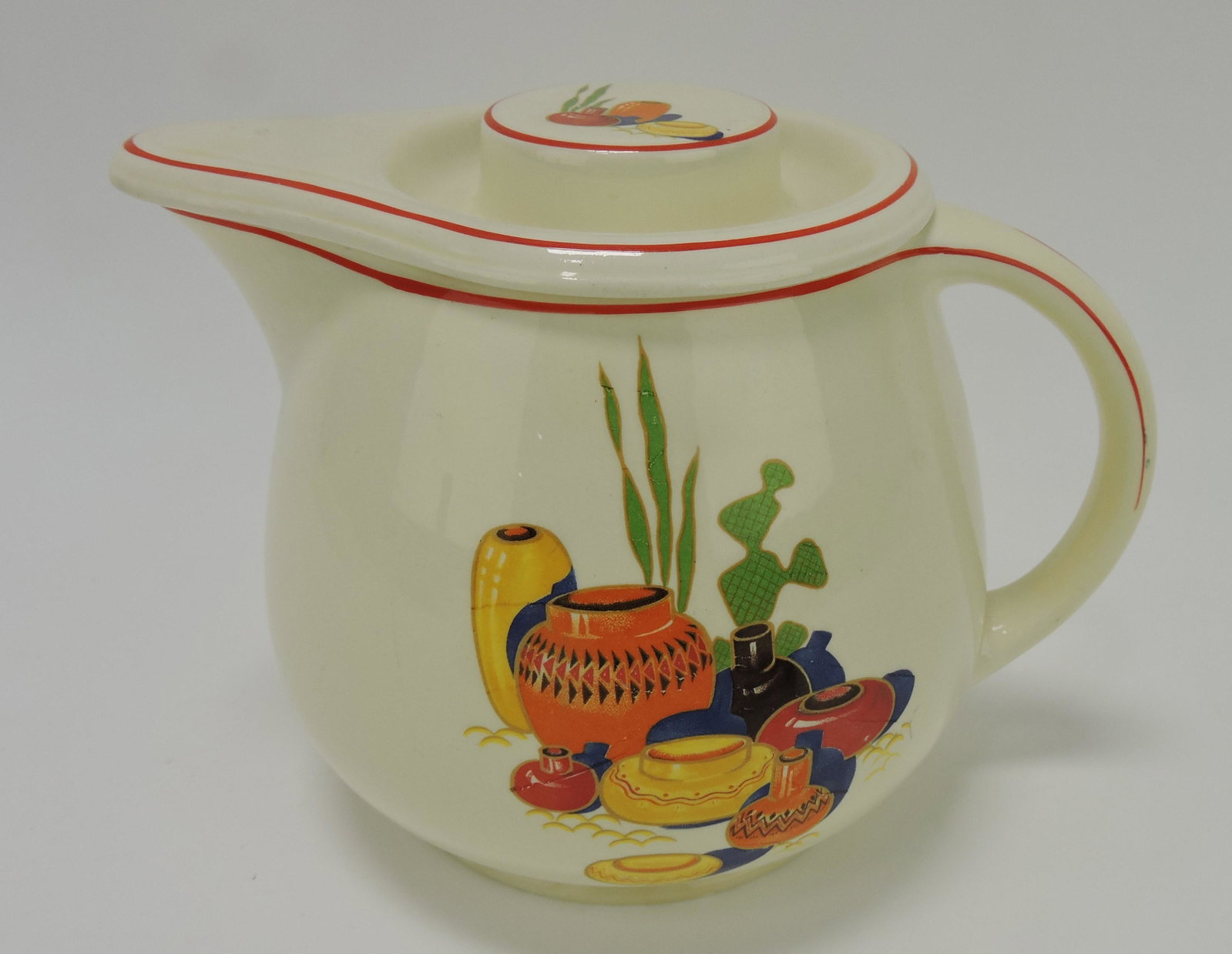 Homer Laughlin Mexicana covered: jug, nick to lid rim