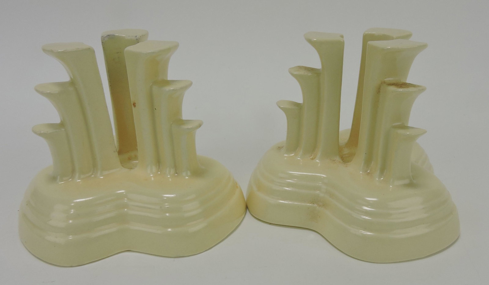 Fiesta tripod candle holder, pair,: ivory, wear to one
