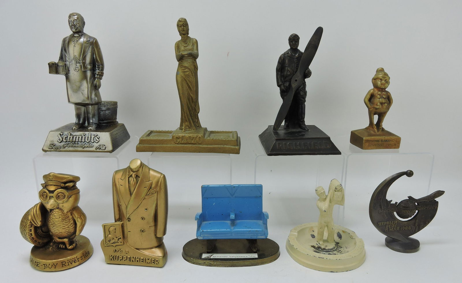 Lot of 9 metal and chalkware advertising (1 of 1)
