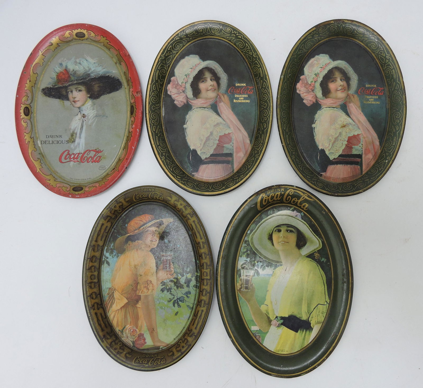 Coca Cola lot of 5 oval tip trays: (1 of 2)
