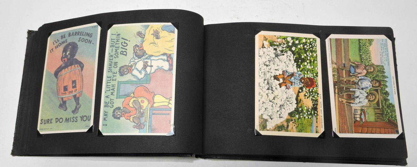 Black Americana postcard album with (1 of 2)