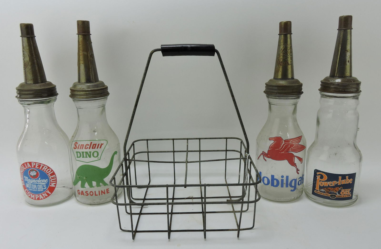 Lot of 4 oil bottles and carrier (1 of 1)