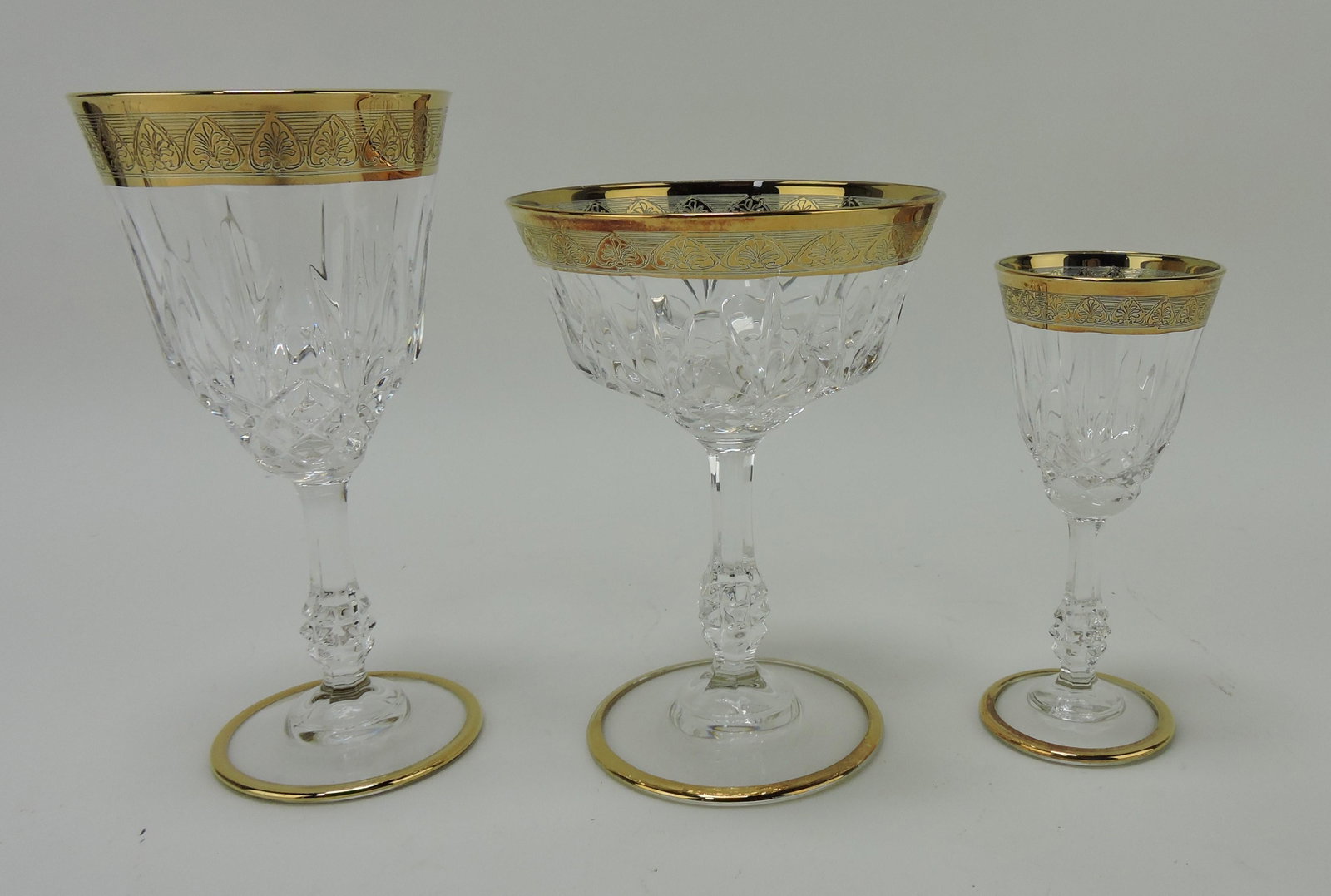 Set of stemware with gold band,: 8 - 6 1/4" water goblets, 8 - 5 1/4" champagne, 4 - 4 1/2" wine