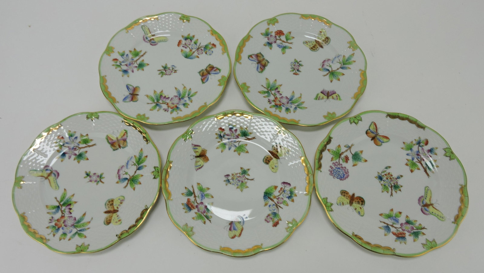 Herend set of 5 - 6 1/2" plates with: butterflies and flowers