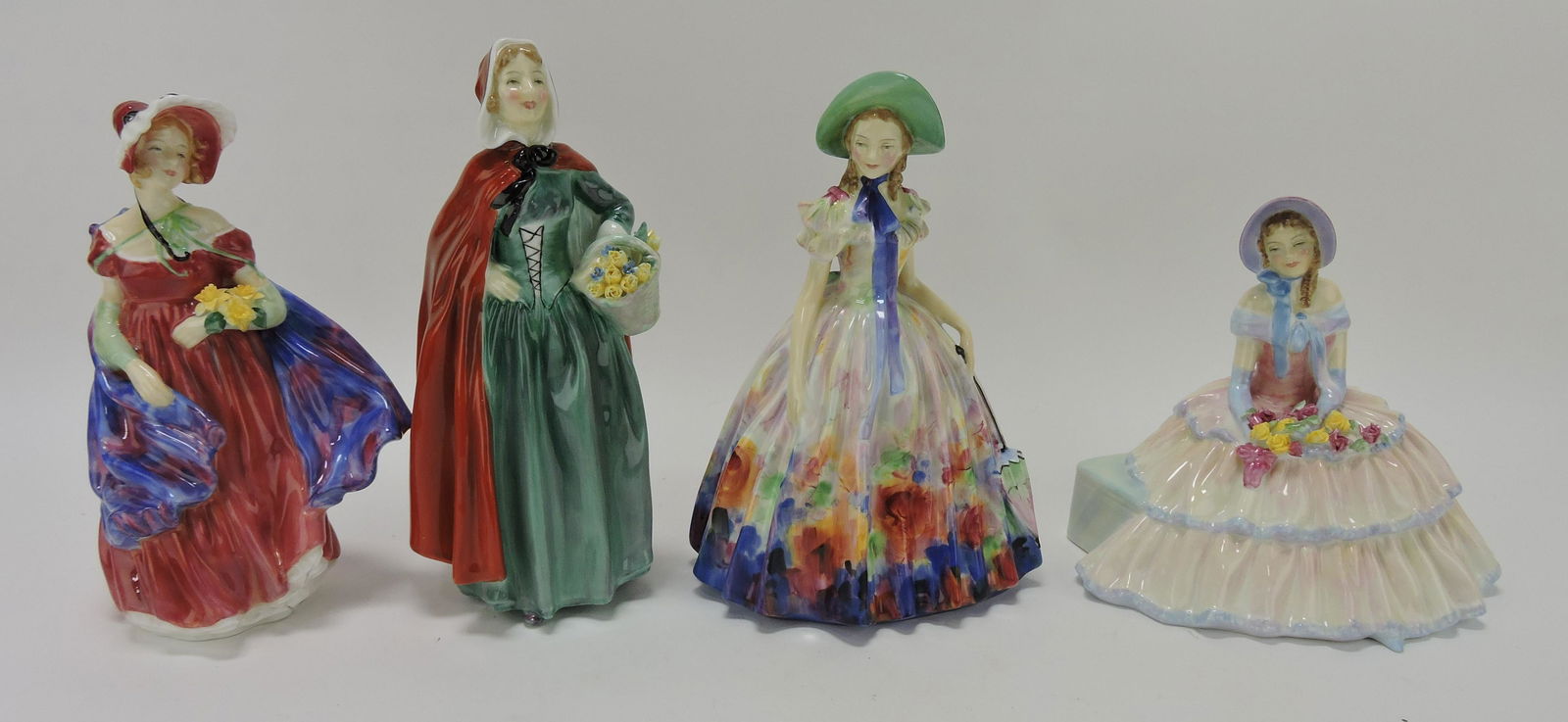 Royal Doulton lot of 4 lady figures: (1 of 1)