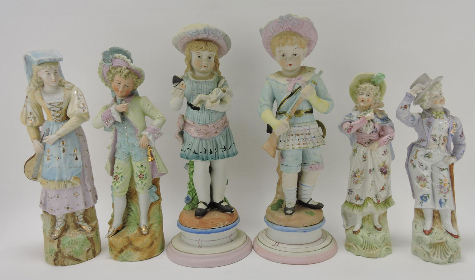 Bisque lot of 3 pair of figures,: 13 to 17"