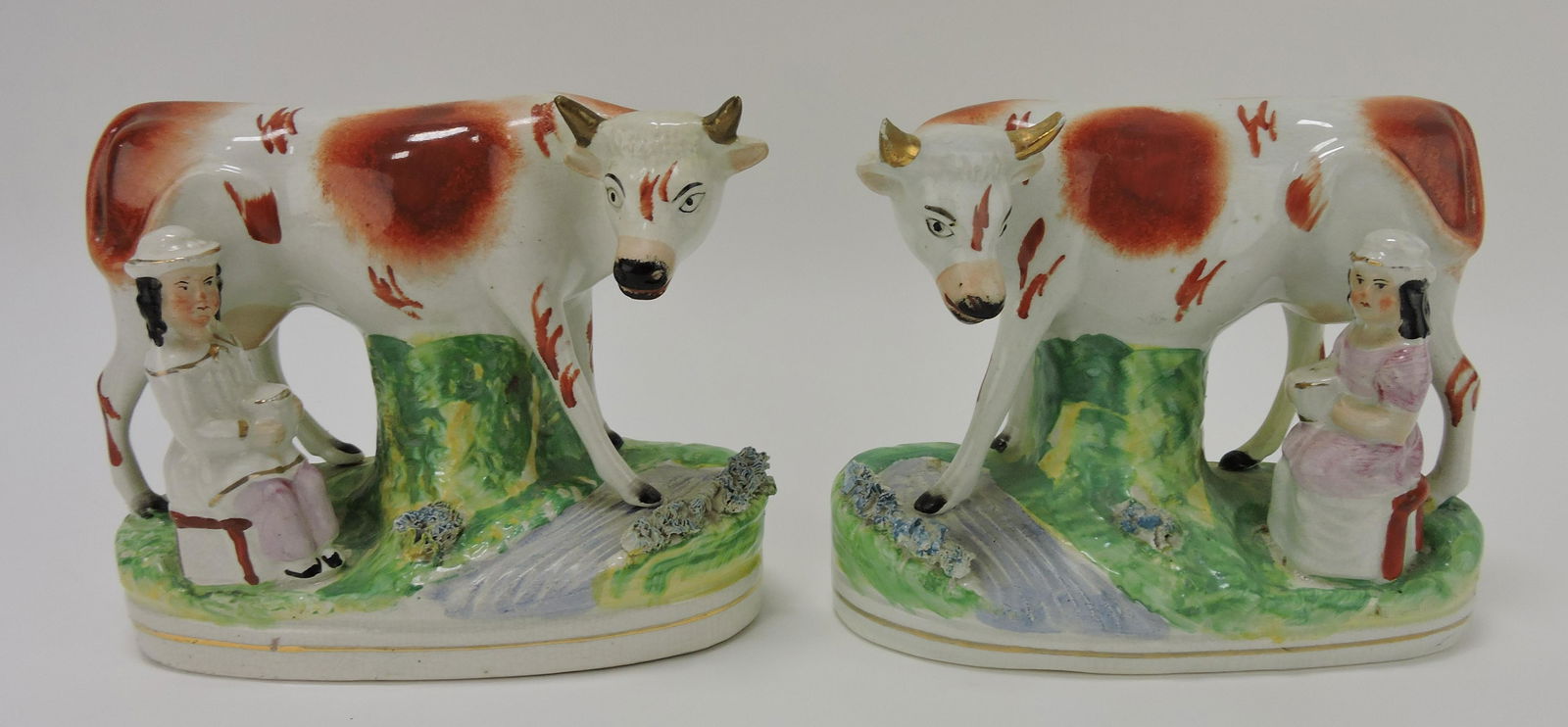 Staffordshire pair of cows with milkmaid (1 of 2)