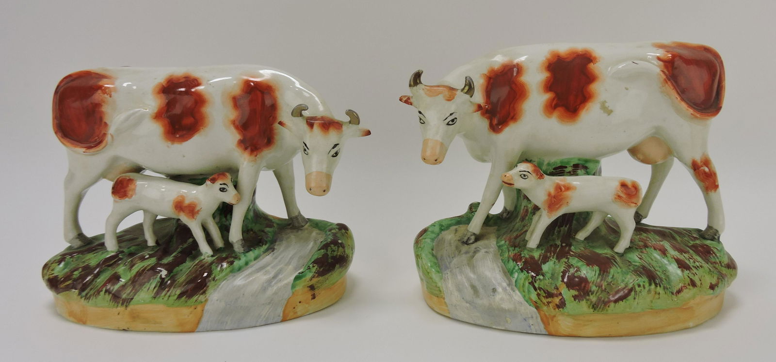 Staffordshire pair of cows with calf (1 of 2)