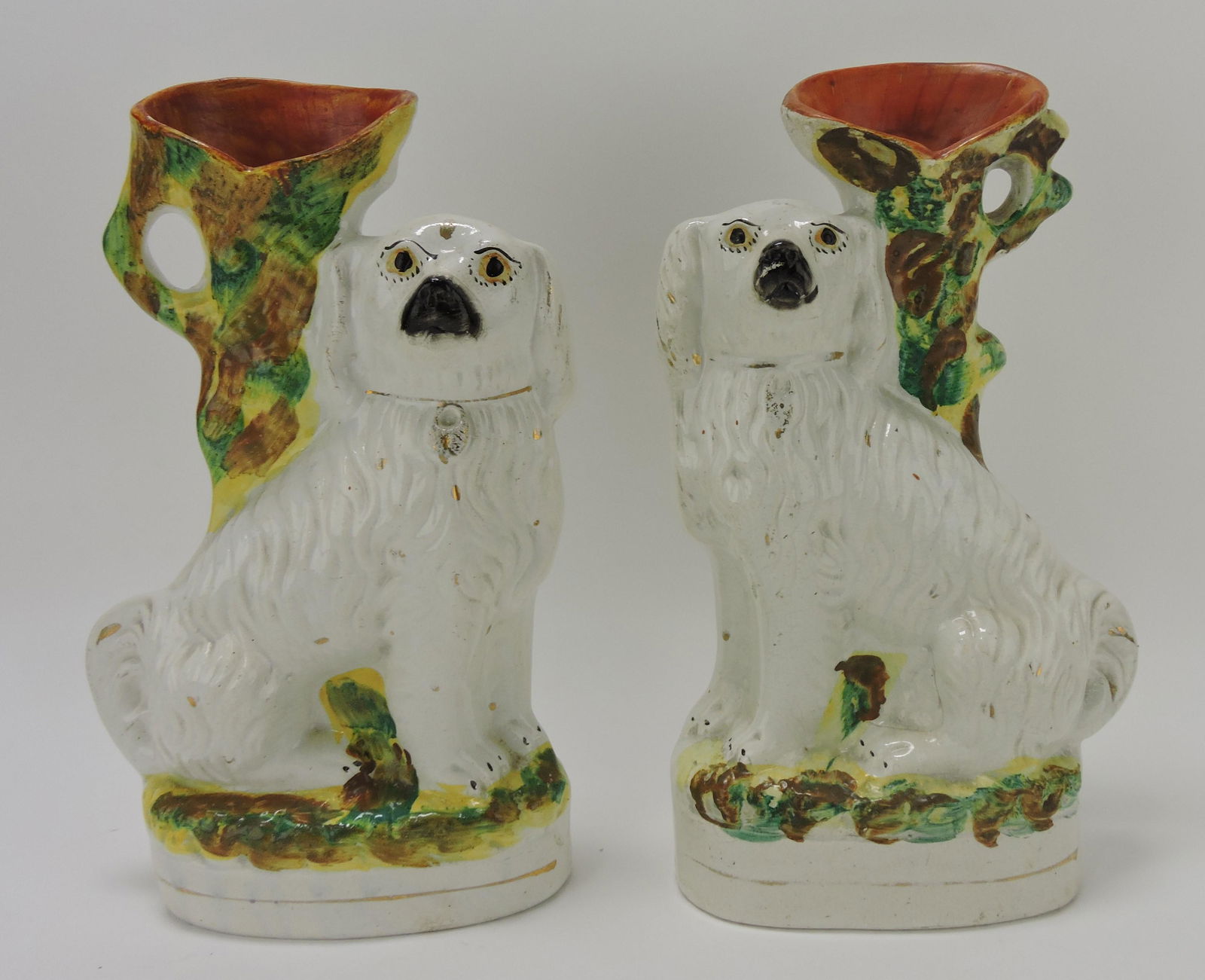 Staffordshire pair of spaniel spill vases, (1 of 2)