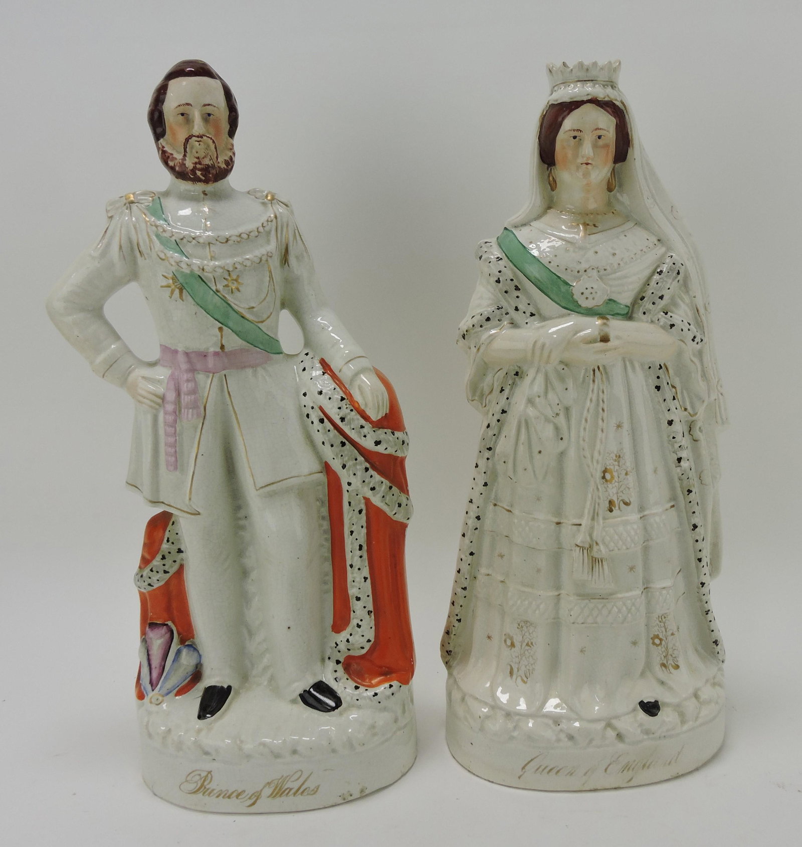 Staffordshire 'Prince of Wales' and: 'Queen of England', 17", repairs to Queen's crown