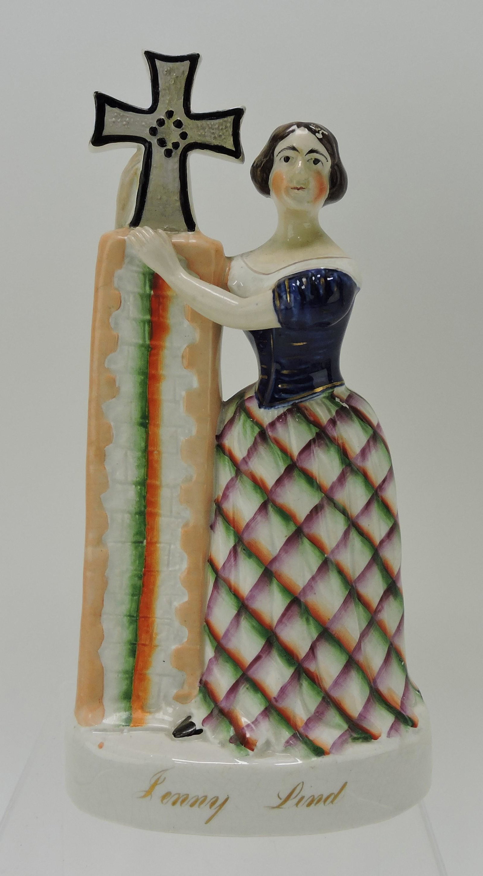 Staffordshire figure of 'Jenny Lind',: repair to neck and cross, 10 1/2"