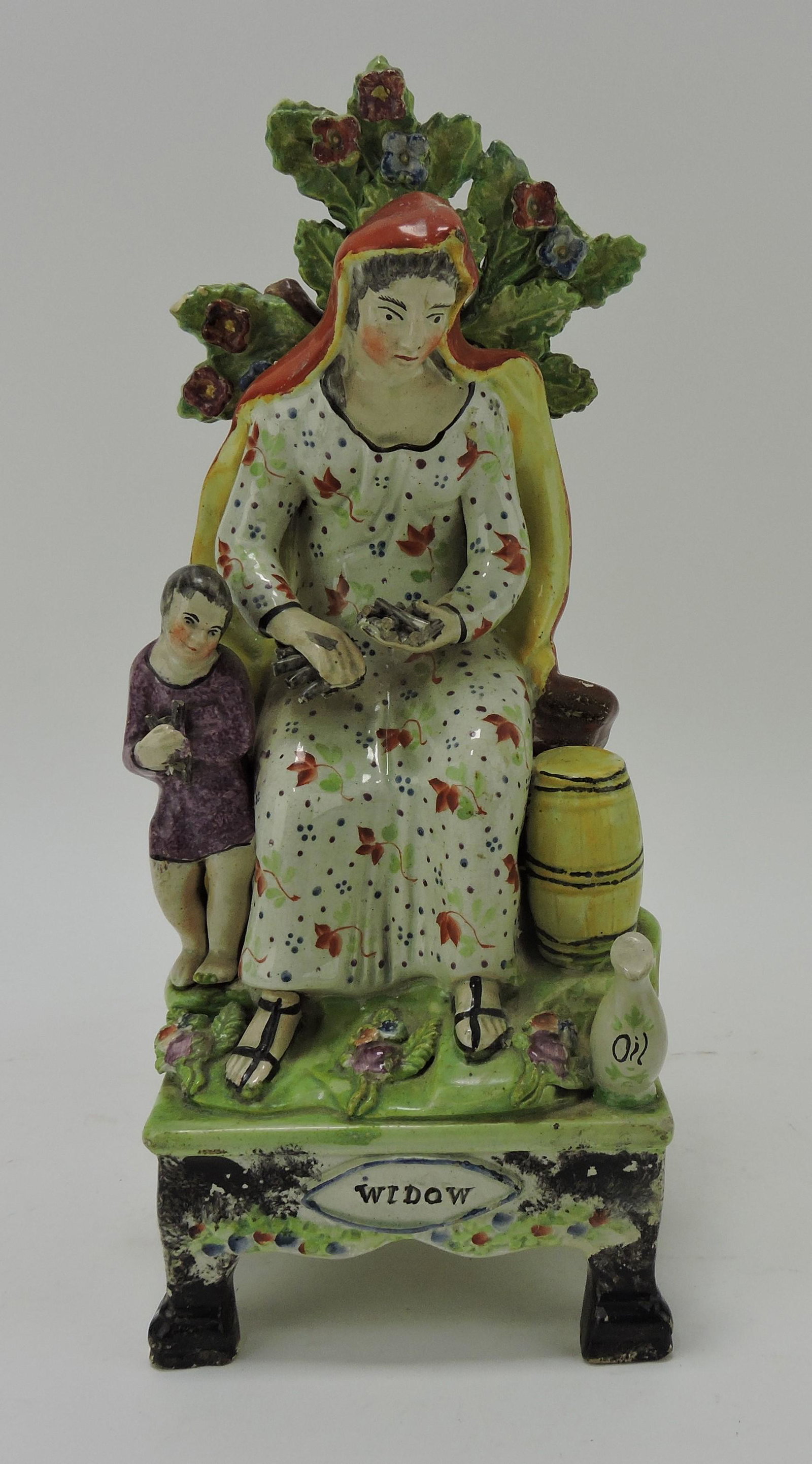 Staffordshire Pearlware 'Widow' figure,: 11", losses and repairs