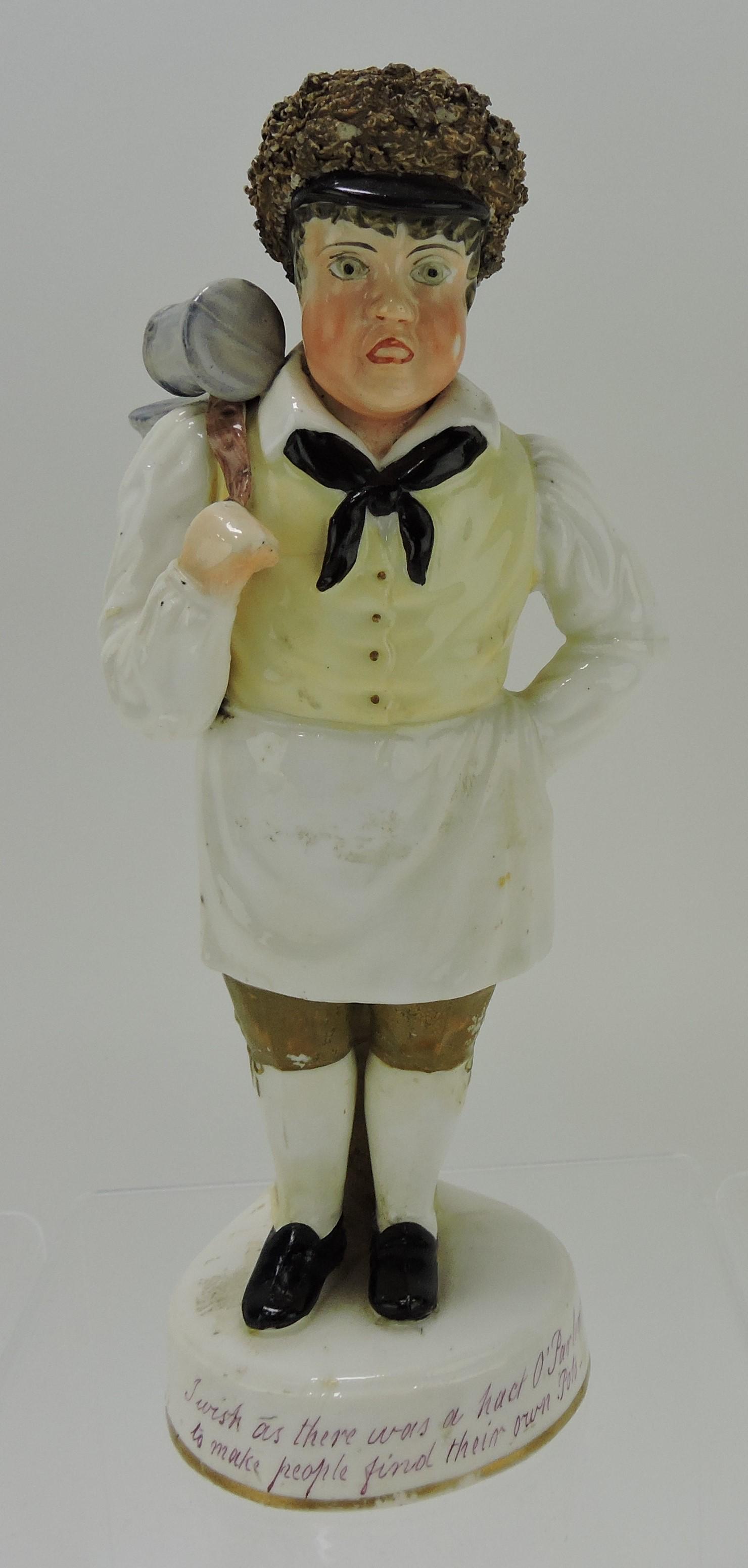 Staffordshire figure 'The Pot Boy': of boy waiter with string of tankard mugs over back, 9"