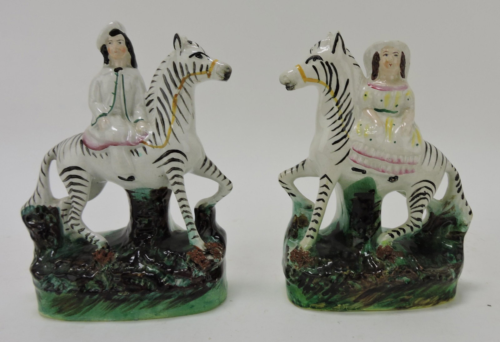 Staffordshire pair of zebras with: children, 6 1/2"
