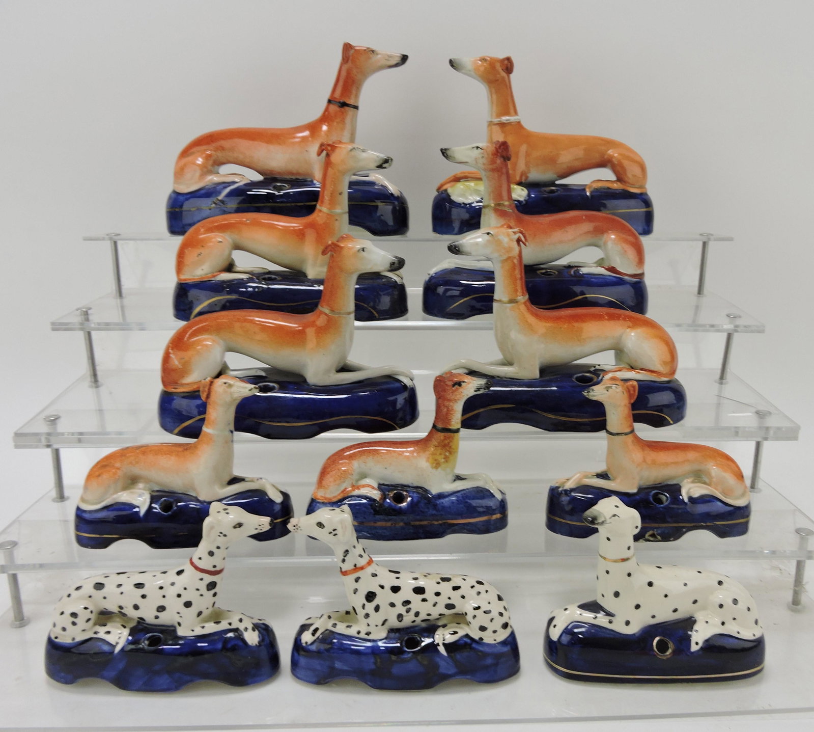 Staffordshire lot of 9 Whippet and: 3 Dalmatian pen holders, various condition