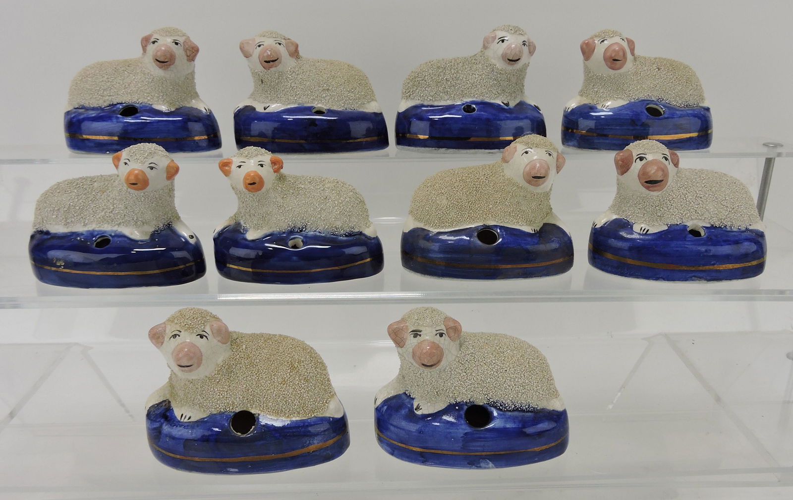 Staffordshire lot of 10 sheep pen holders: .