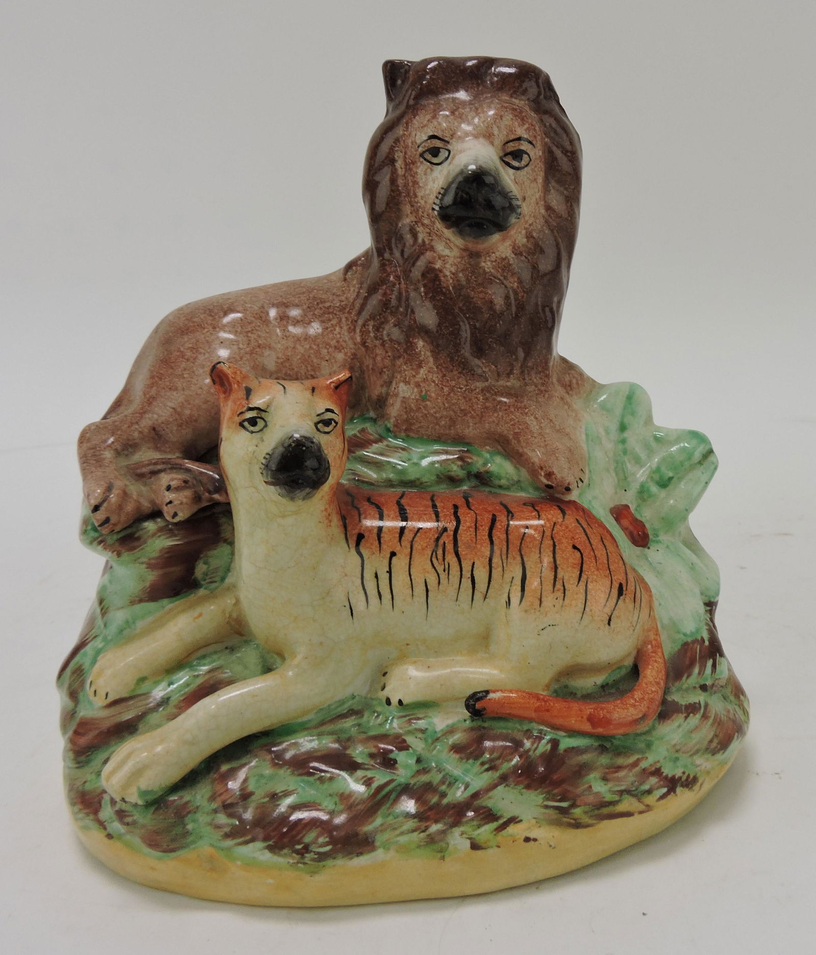 Staffordshire lion and tiger figure, 7" (1 of 2)