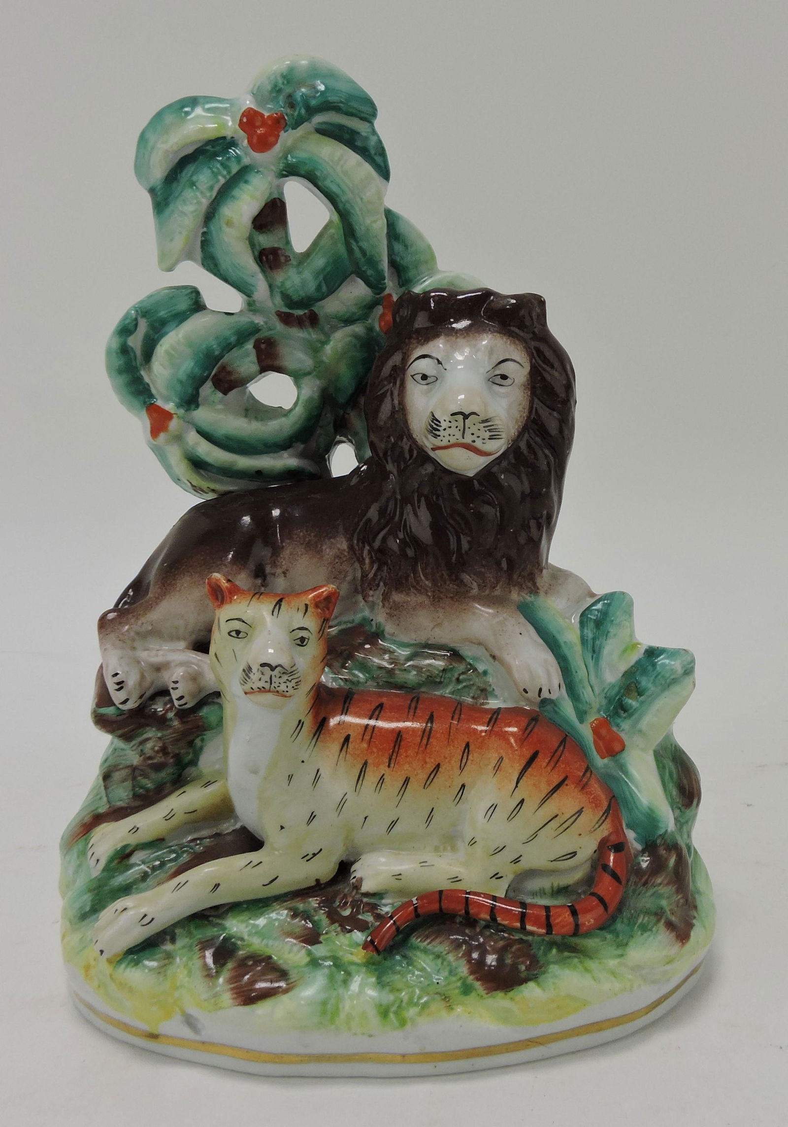 Staffordshire lion and tiger figure, 8" (1 of 2)