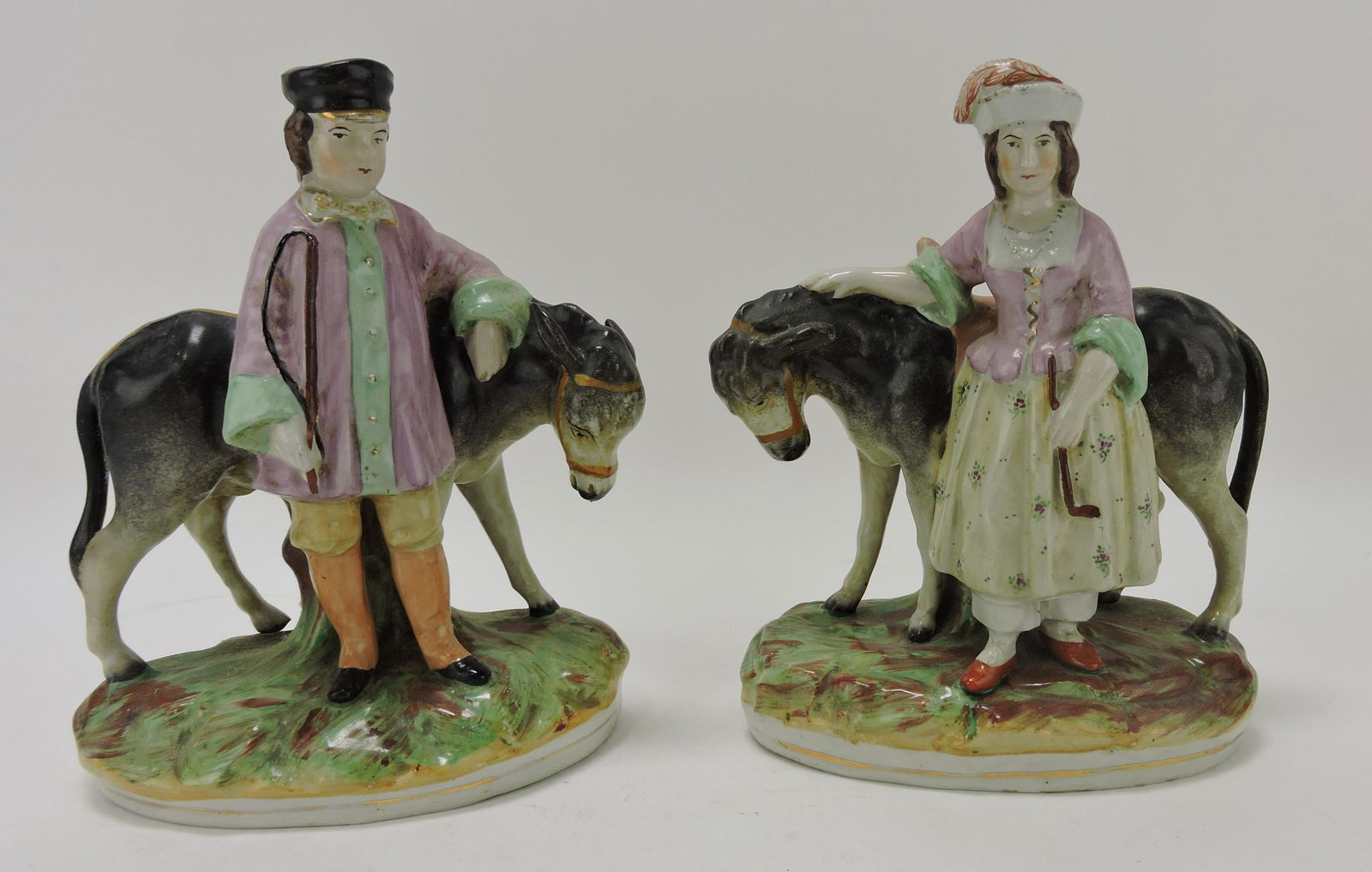 Staffordshire pair of donkey figures (1 of 2)