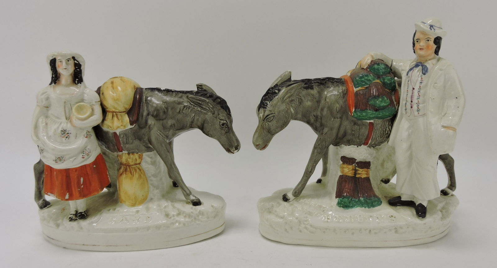 Staffordshire pair of donkey figures (1 of 2)